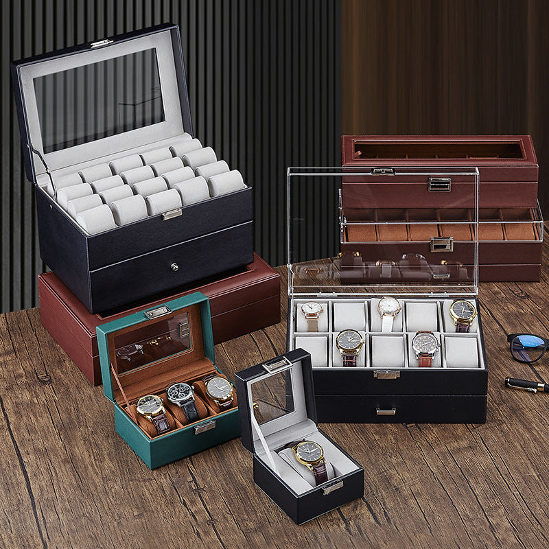Three-quarter angle of black PU leather six-position single-layer watch box with closed lid and metal clasp visible