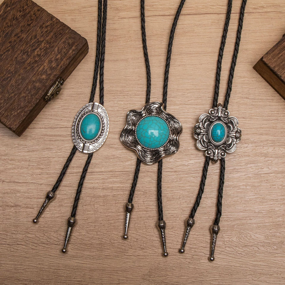 Close-up front view of leather Y-shaped adjustable electroplated alloy pendant necklace featuring black leather strap and geometric pendant on standard chain